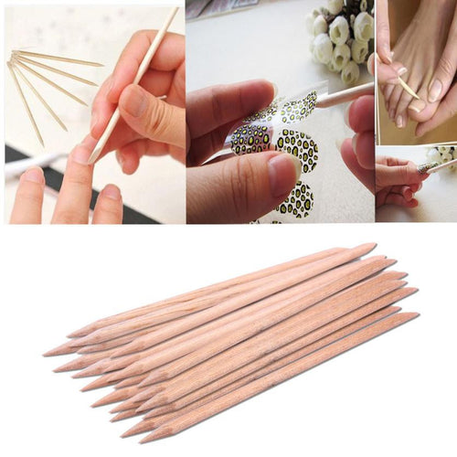 Hot 20PCS Nail Art Orange Wood Stick Cuticle Pusher Remover Pedicure Manicure Tool not easy to harm your nails 2017 Anne